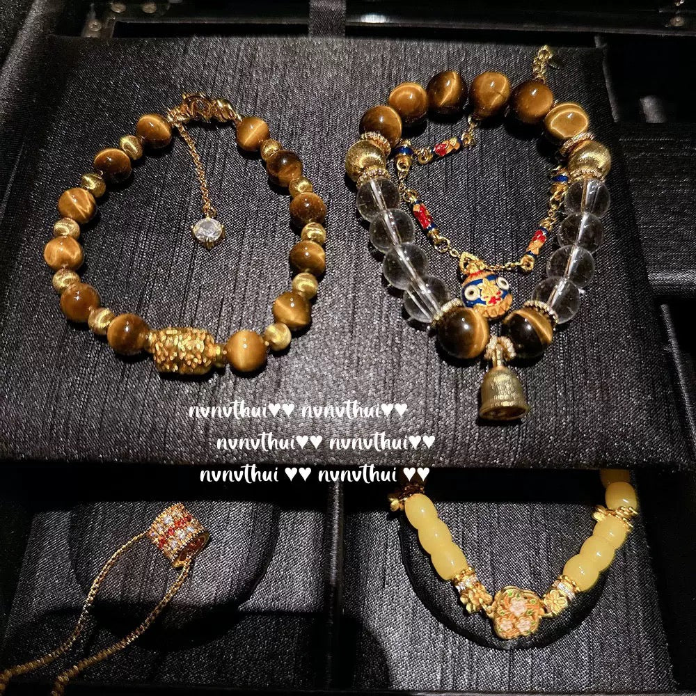 Ancient-style golden brushed ball-shaped tigereye stone bell crystal bracelet, new Chinese-style laurel rabbit saffron-yellow beeswax bracelet