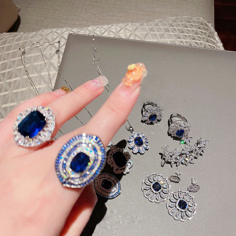 Deep sea sapphire flower necklace designer plated with 18K gold, navy blue zircon, multi-layer geometric surround flower earrings