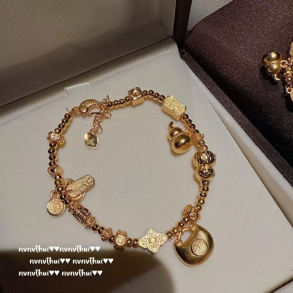 Ancient-style golden inlaid star-shaped small yellow fish coiled bracelet, new Chinese style, rich lady, copper coin gourd fortune bead bracelet