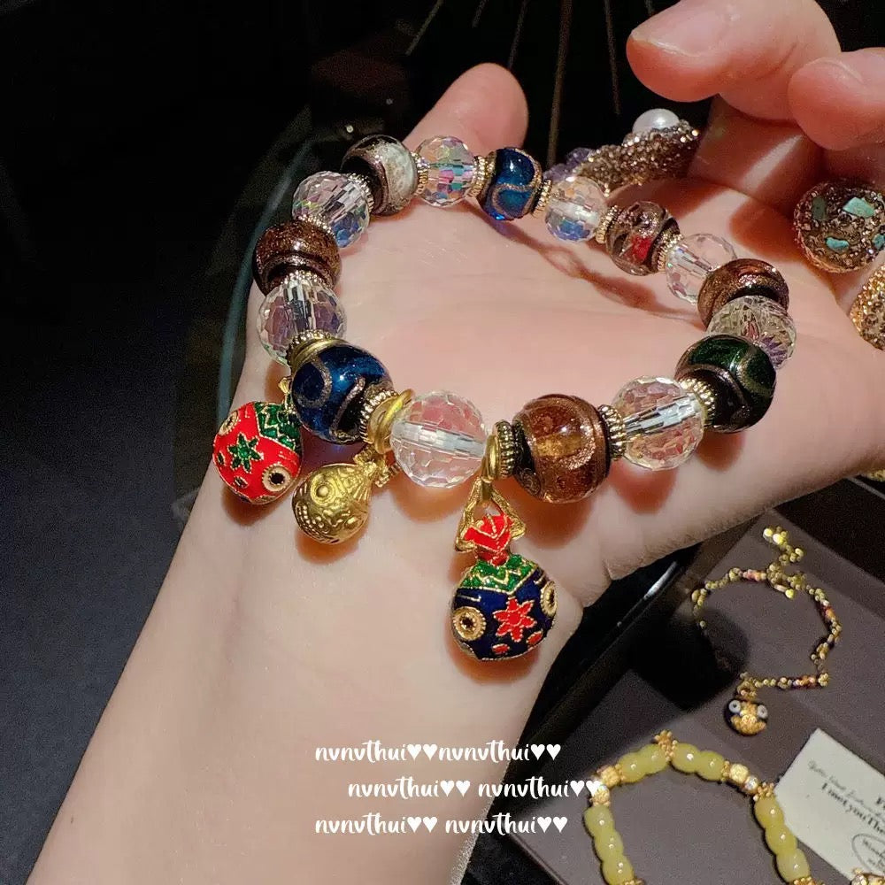 Ancient-style golden brushed ball-shaped tigereye stone bell crystal bracelet, new Chinese-style laurel rabbit saffron-yellow beeswax bracelet