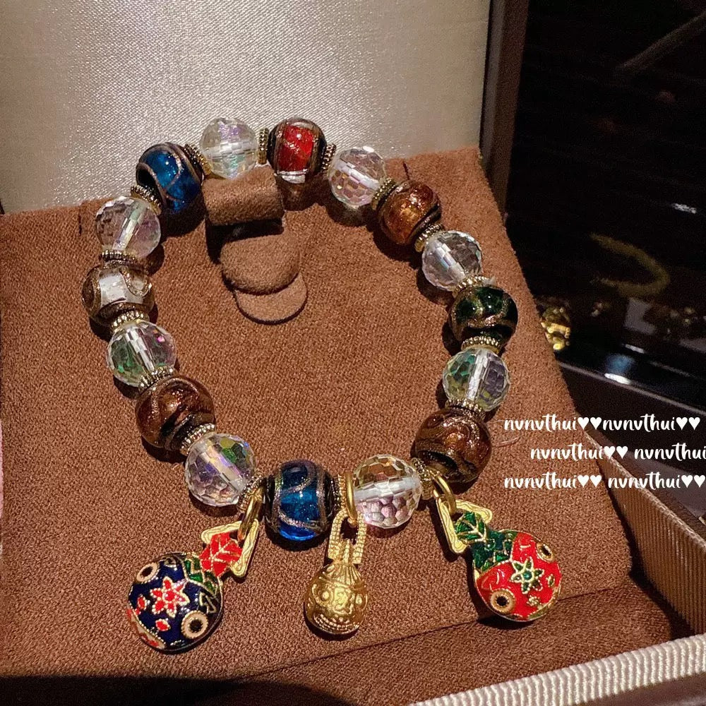 Ancient-style golden brushed ball-shaped tigereye stone bell crystal bracelet, new Chinese-style laurel rabbit saffron-yellow beeswax bracelet