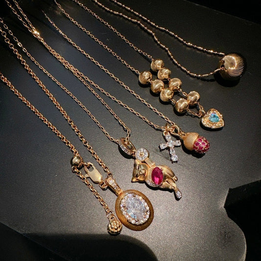 Vintage Italian brushed pine cone cross gemstone necklace, pigeon egg zircon necklace, layered and worn