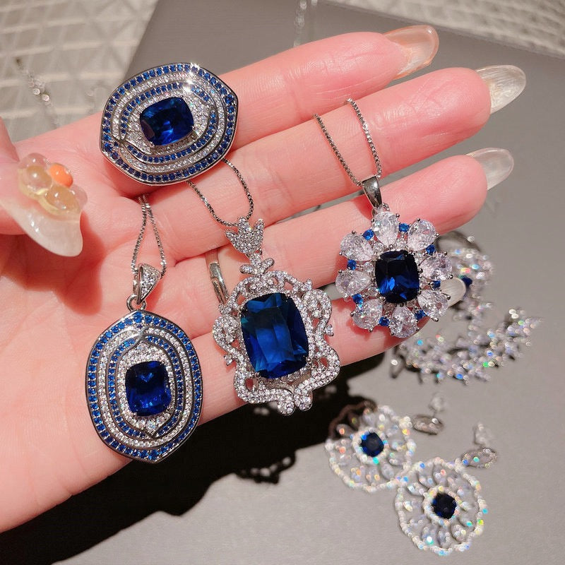 Deep sea sapphire flower necklace designer plated with 18K gold, navy blue zircon, multi-layer geometric surround flower earrings