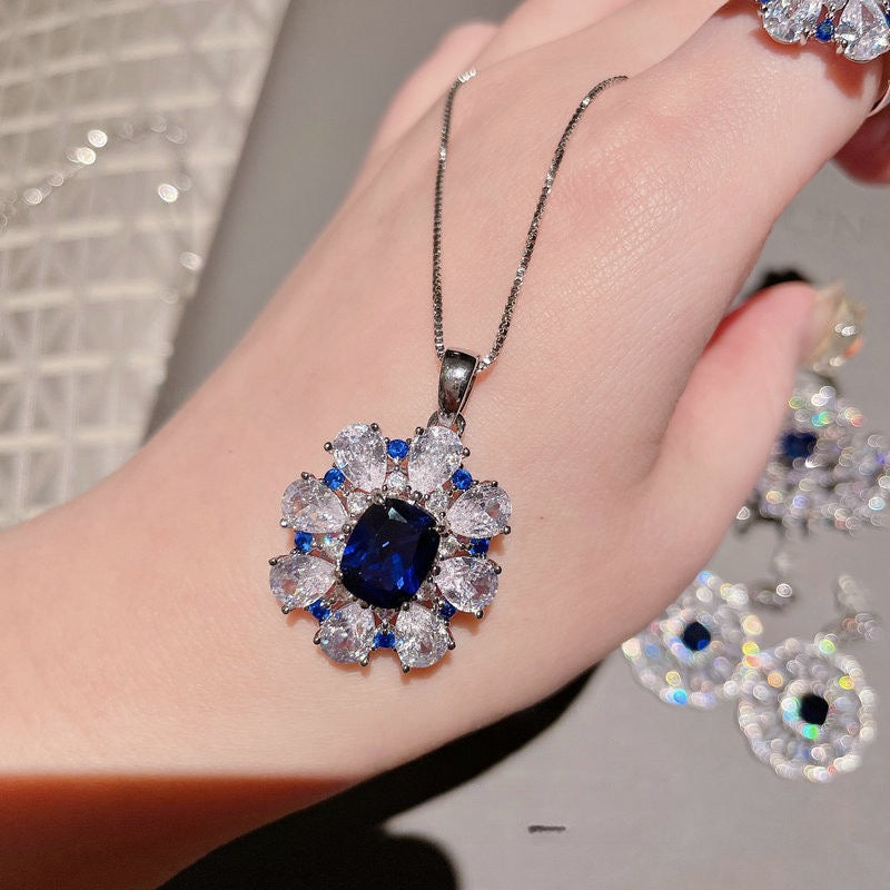 Deep sea sapphire flower necklace designer plated with 18K gold, navy blue zircon, multi-layer geometric surround flower earrings