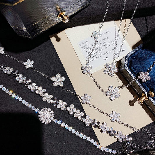 Sparkling flower gemstone bracelet plated with 18K gold snowflake zircon full diamond small flower daisy necklace earrings