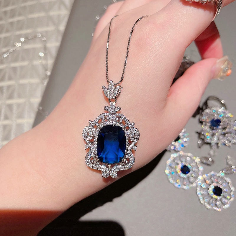 Deep sea sapphire flower necklace designer plated with 18K gold, navy blue zircon, multi-layer geometric surround flower earrings