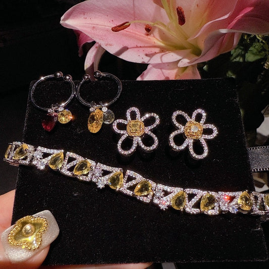 Yellow fluorite osmanthus honey daisy gemstone earrings plated with 18K gold irregular water droplet zircon bracelet