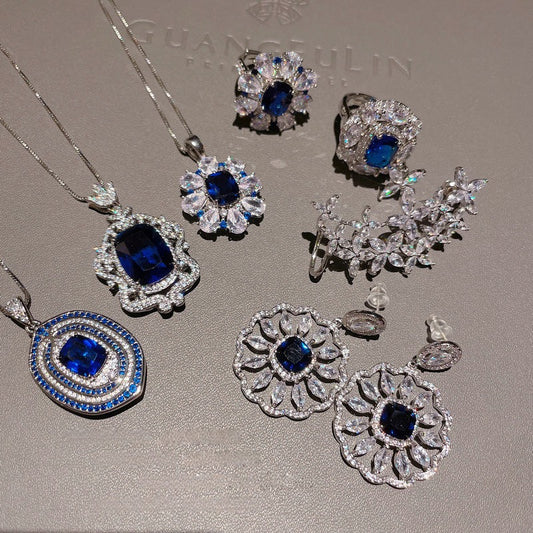 Deep sea sapphire flower necklace designer plated with 18K gold, navy blue zircon, multi-layer geometric surround flower earrings