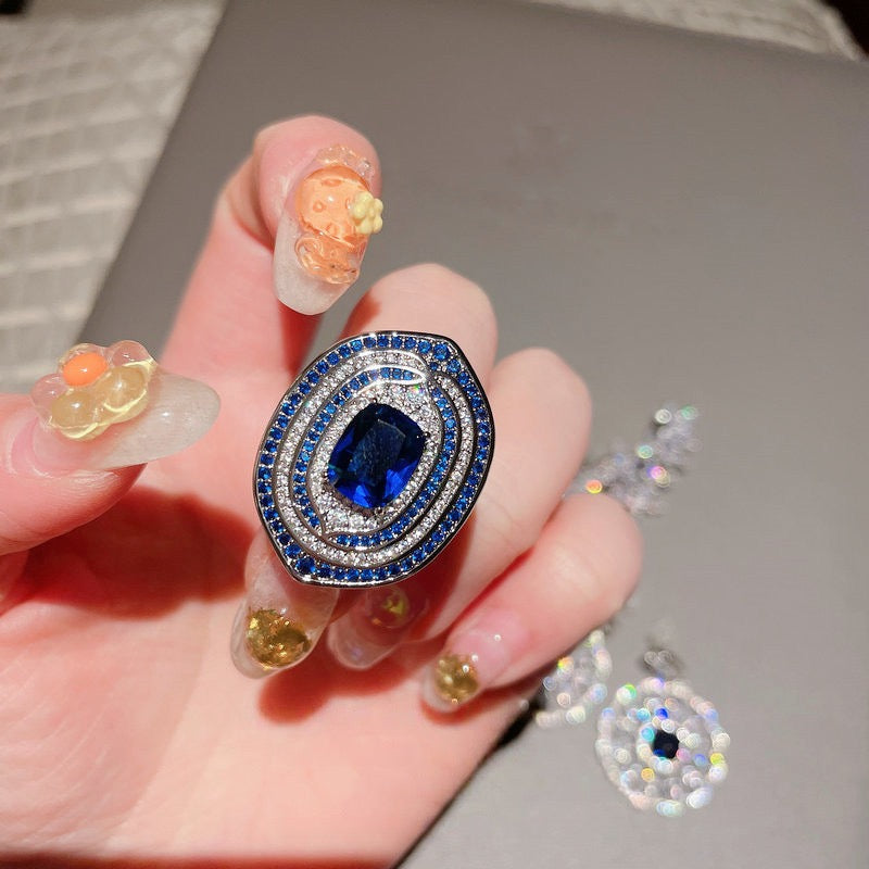 Deep sea sapphire flower necklace designer plated with 18K gold, navy blue zircon, multi-layer geometric surround flower earrings