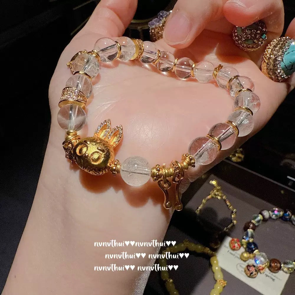 Ancient-style golden brushed ball-shaped tigereye stone bell crystal bracelet, new Chinese-style laurel rabbit saffron-yellow beeswax bracelet
