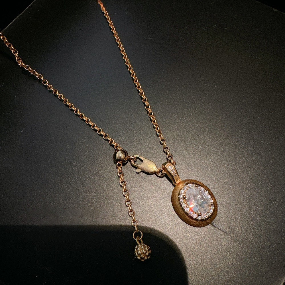 Vintage Italian brushed pine cone cross gemstone necklace, pigeon egg zircon necklace, layered and worn