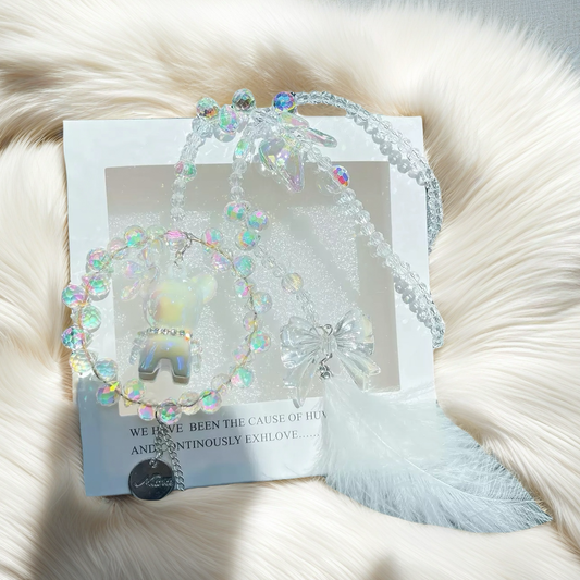 A cute car hanging decoration with a deer, a flower and feathers. It's a lovely rearview mirror car accessory for goddesses.