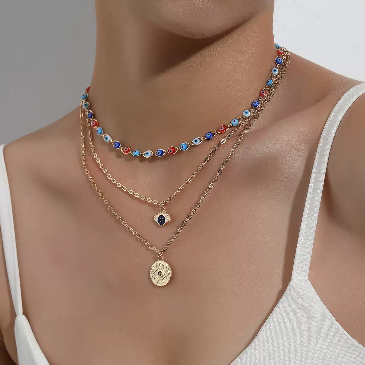 New multi-layered "Devil's Eye" pendant necklace for women, fashionable, exaggerated and trendy eye-shaped jewelry.